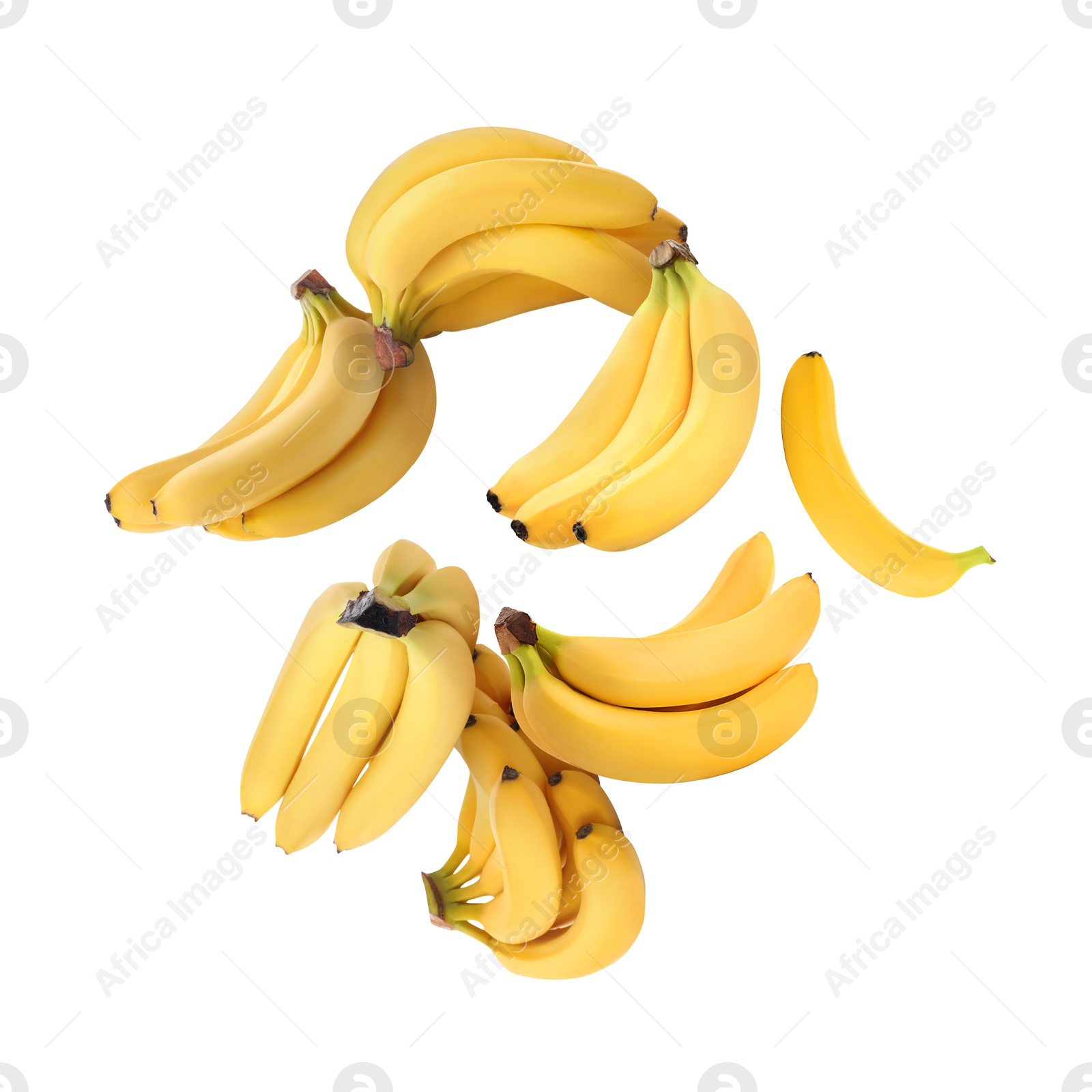 Image of Many yellow bananas in air on white background