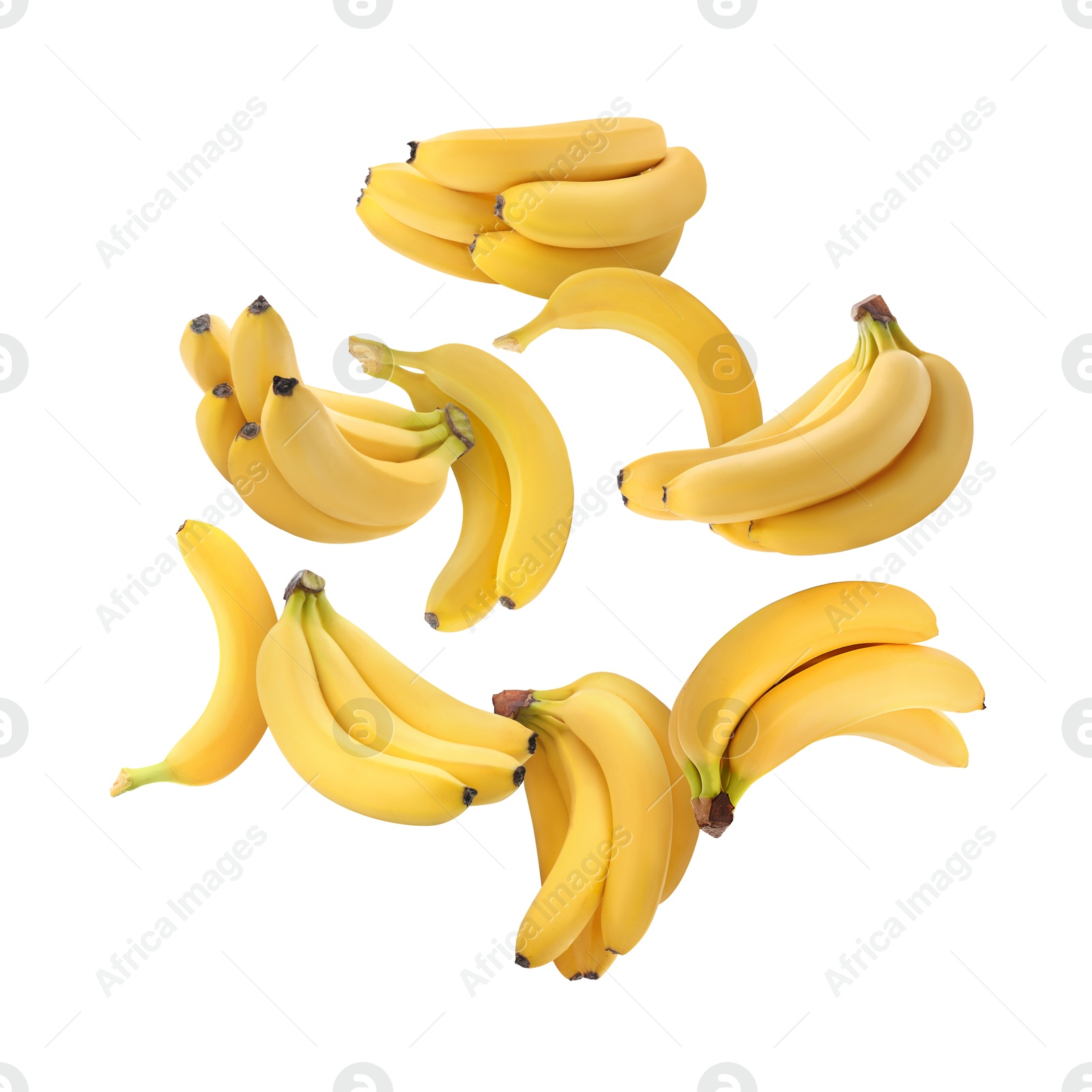 Image of Many yellow bananas in air on white background