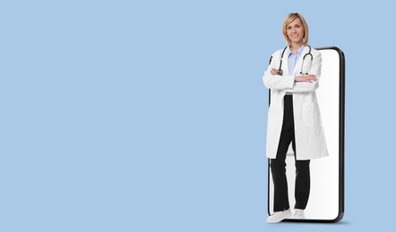 Online medical consultation. Doctor on smartphone screen against light blue background. Banner design with space for text