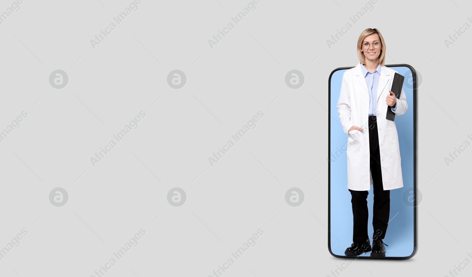 Image of Online medical consultation. Doctor with clipboard on smartphone screen against light grey background. Banner design with space for text