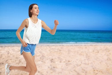 Beautiful woman running on beach. Space for text