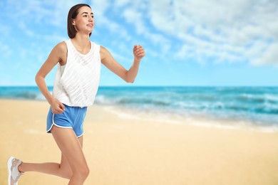 Image of Beautiful woman running on beach. Space for text