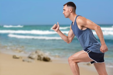 Image of Sporty man running on beach. Space for text