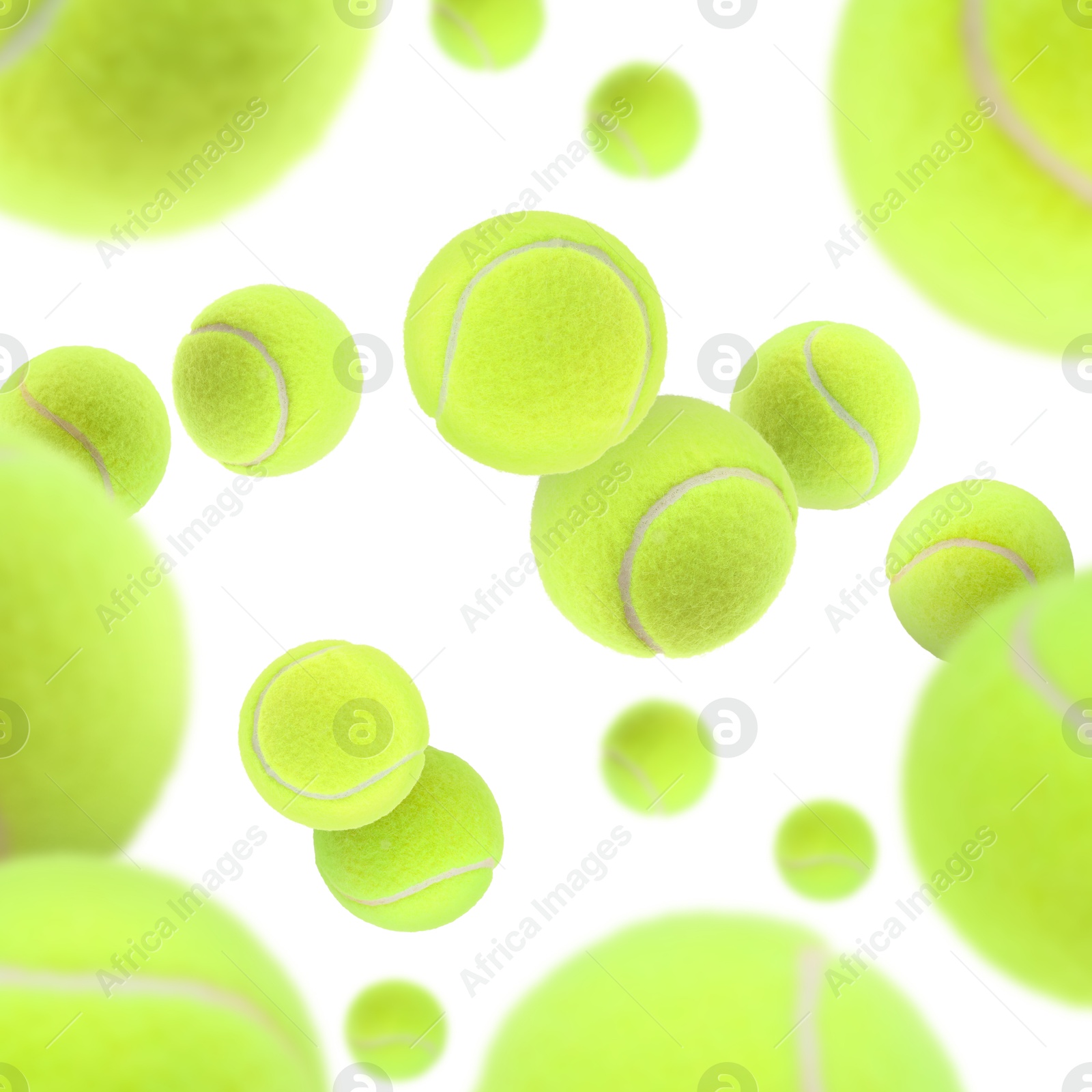 Image of Many bright tennis balls in air on white background