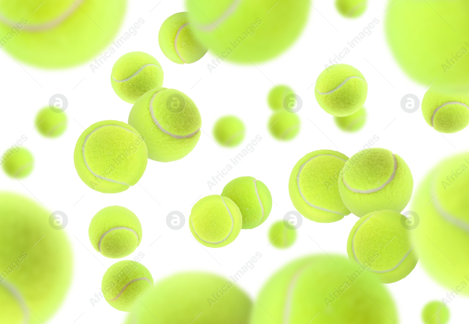 Image of Many bright tennis balls in air on white background