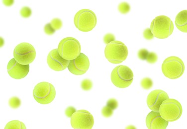 Image of Many bright tennis balls in air on white background