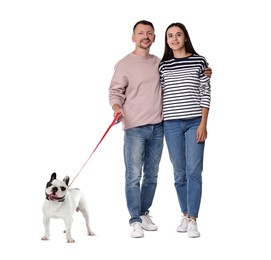 Happy couple walking their dog on white background