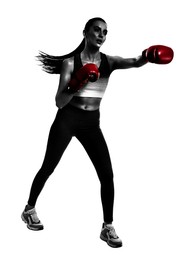 Image of Woman in red boxing gloves training on white background. Black-and-white effect with color accent