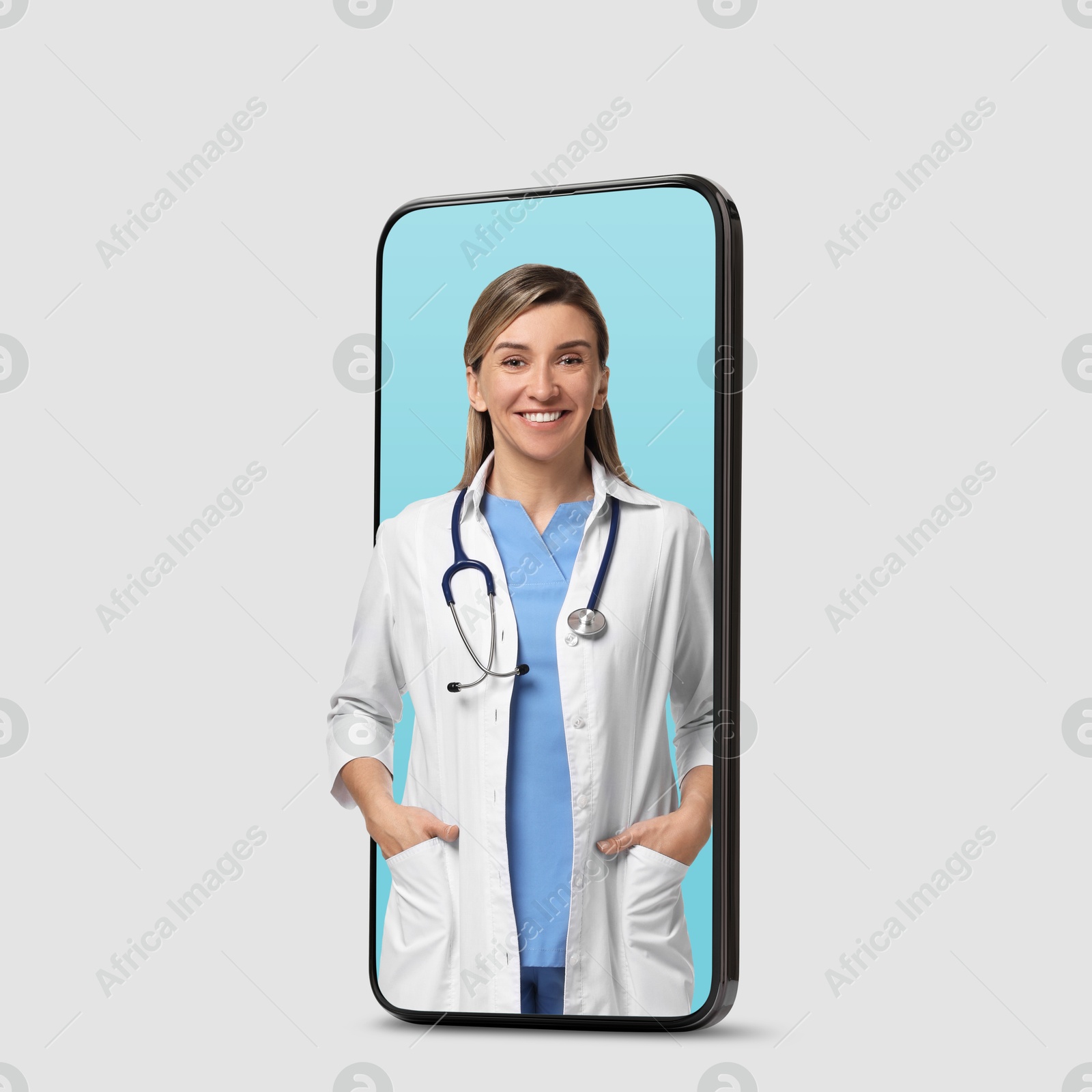 Image of Online medical consultation. Doctor on smartphone screen against light grey background