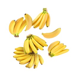 Image of Many yellow bananas in air on white background