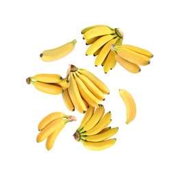 Image of Many yellow bananas in air on white background