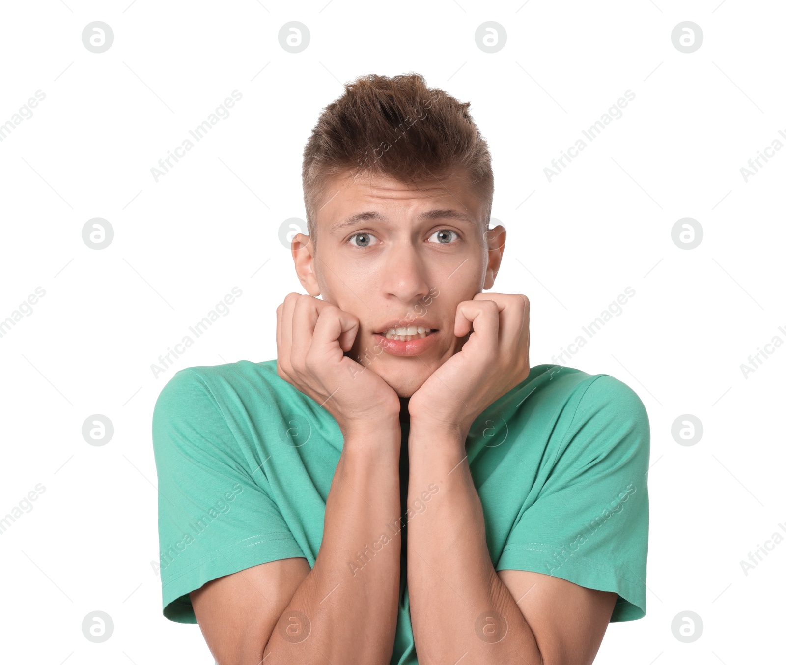 Photo of Portrait of scared young man on white background