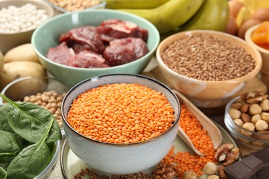 Different products rich in iron on table, closeup. Diet plan for anemia