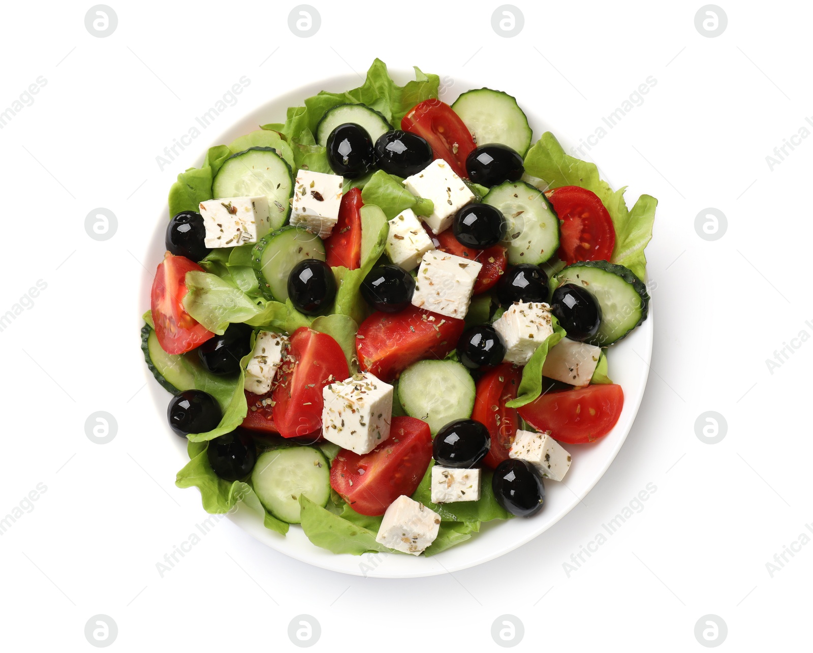 Photo of Delicious salad with feta cheese isolated on white, top view