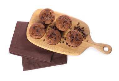 Photo of Delicious sweet muffins with chocolate chips isolated on white, top view