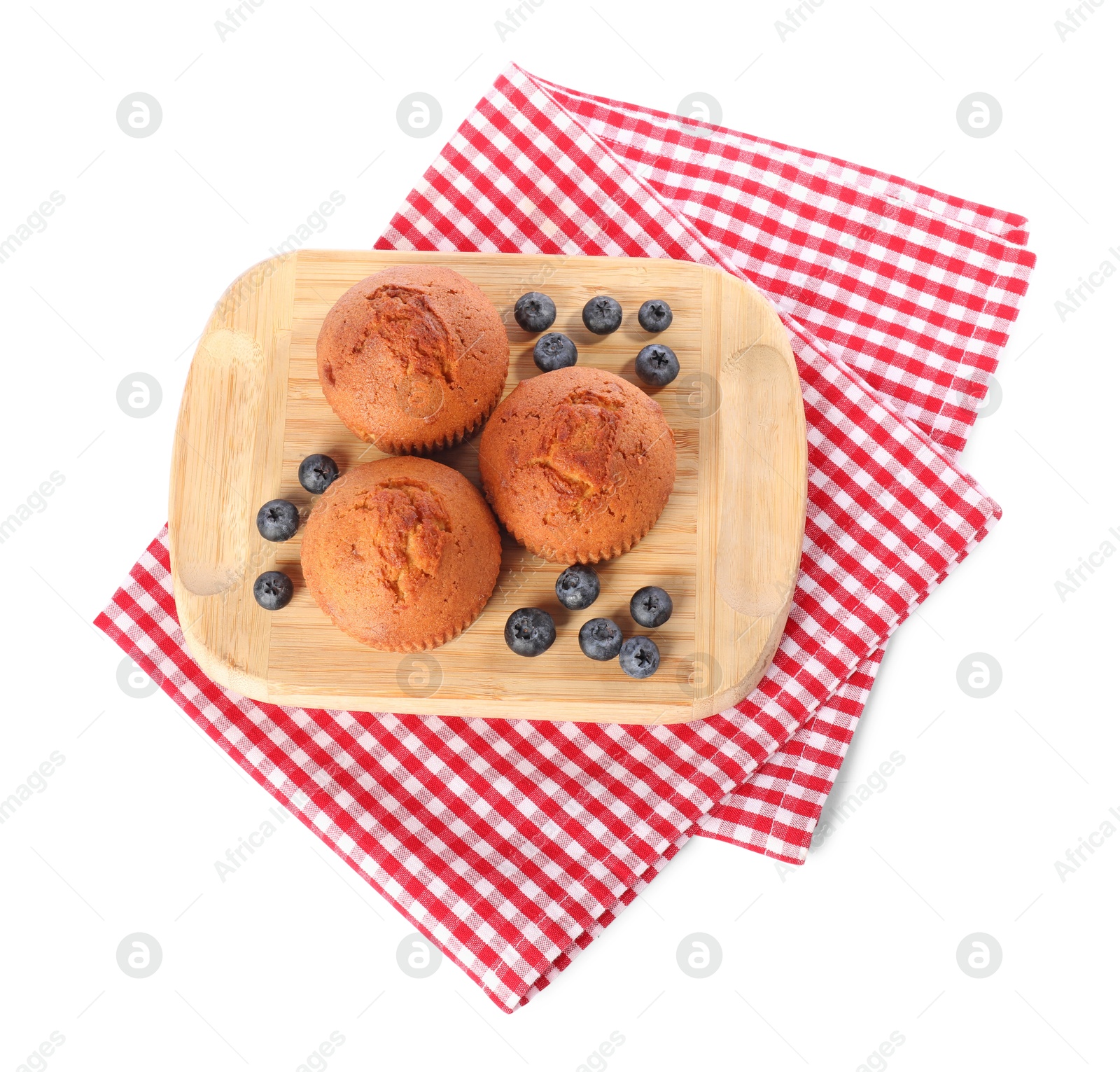 Photo of Delicious sweet muffins and blueberries isolated on white, top view