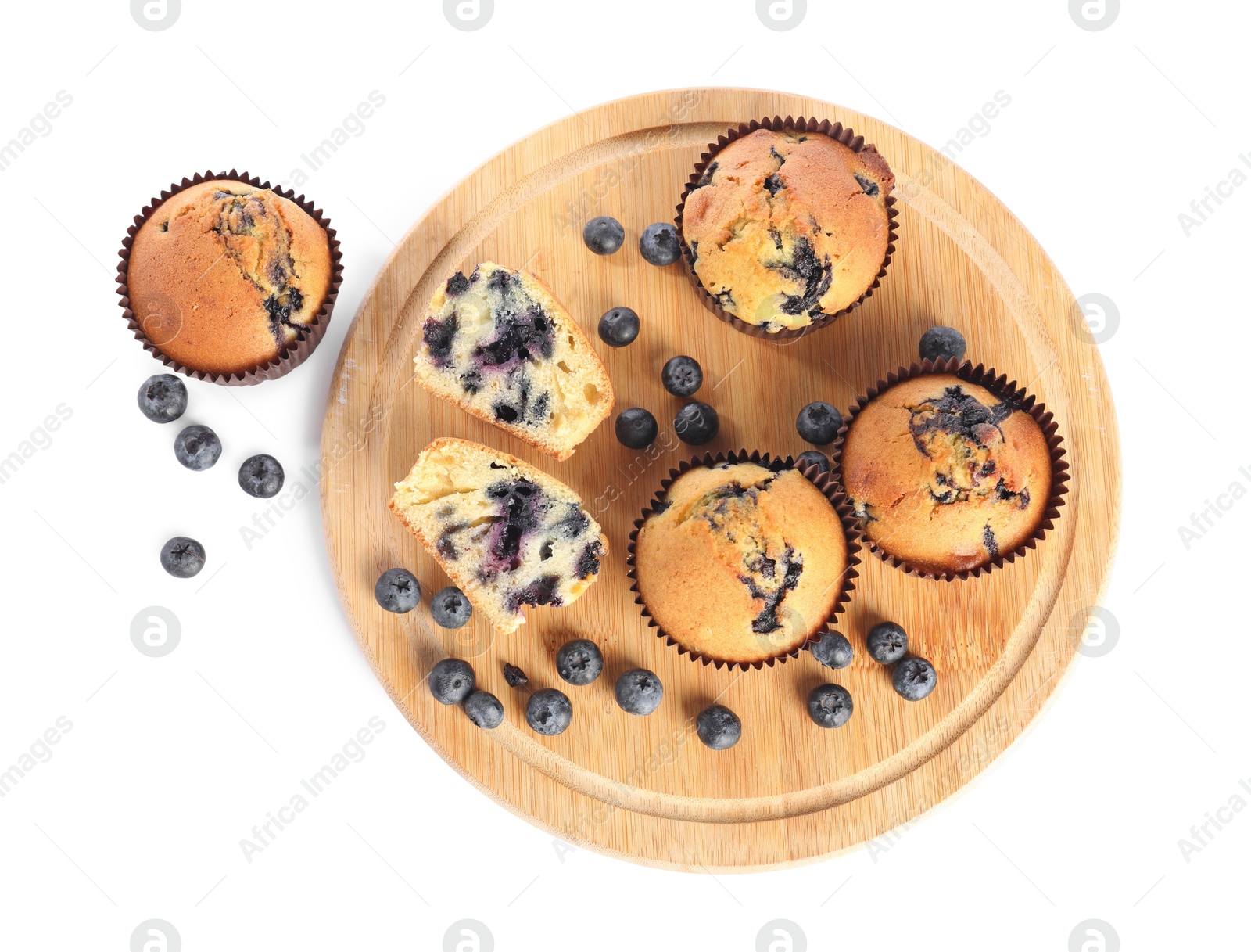 Photo of Delicious sweet muffins with blueberries isolated on white, top view