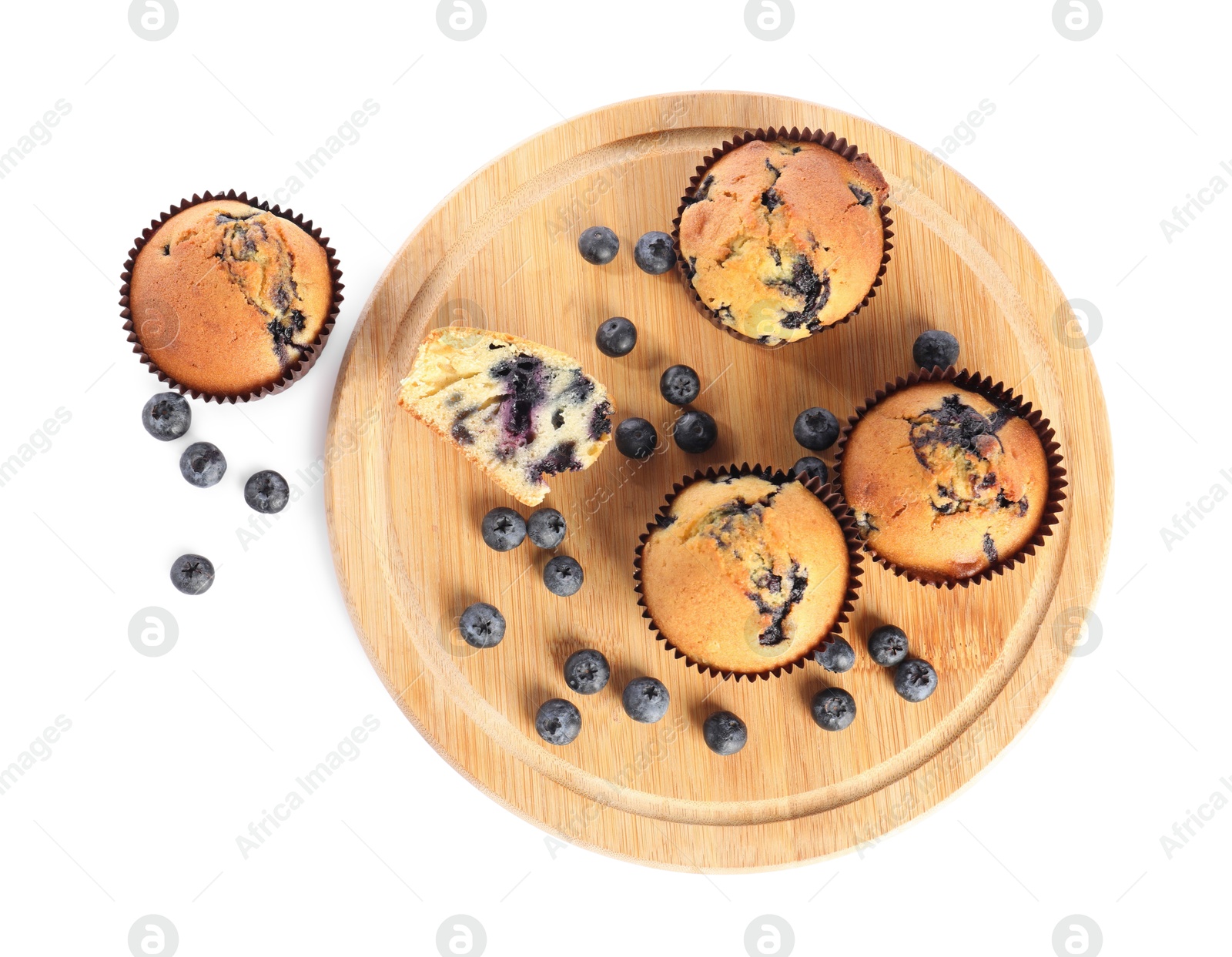 Photo of Delicious sweet muffins with blueberries isolated on white, top view