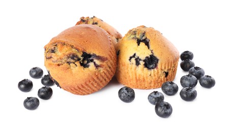 Photo of Delicious sweet muffins with blueberries isolated on white