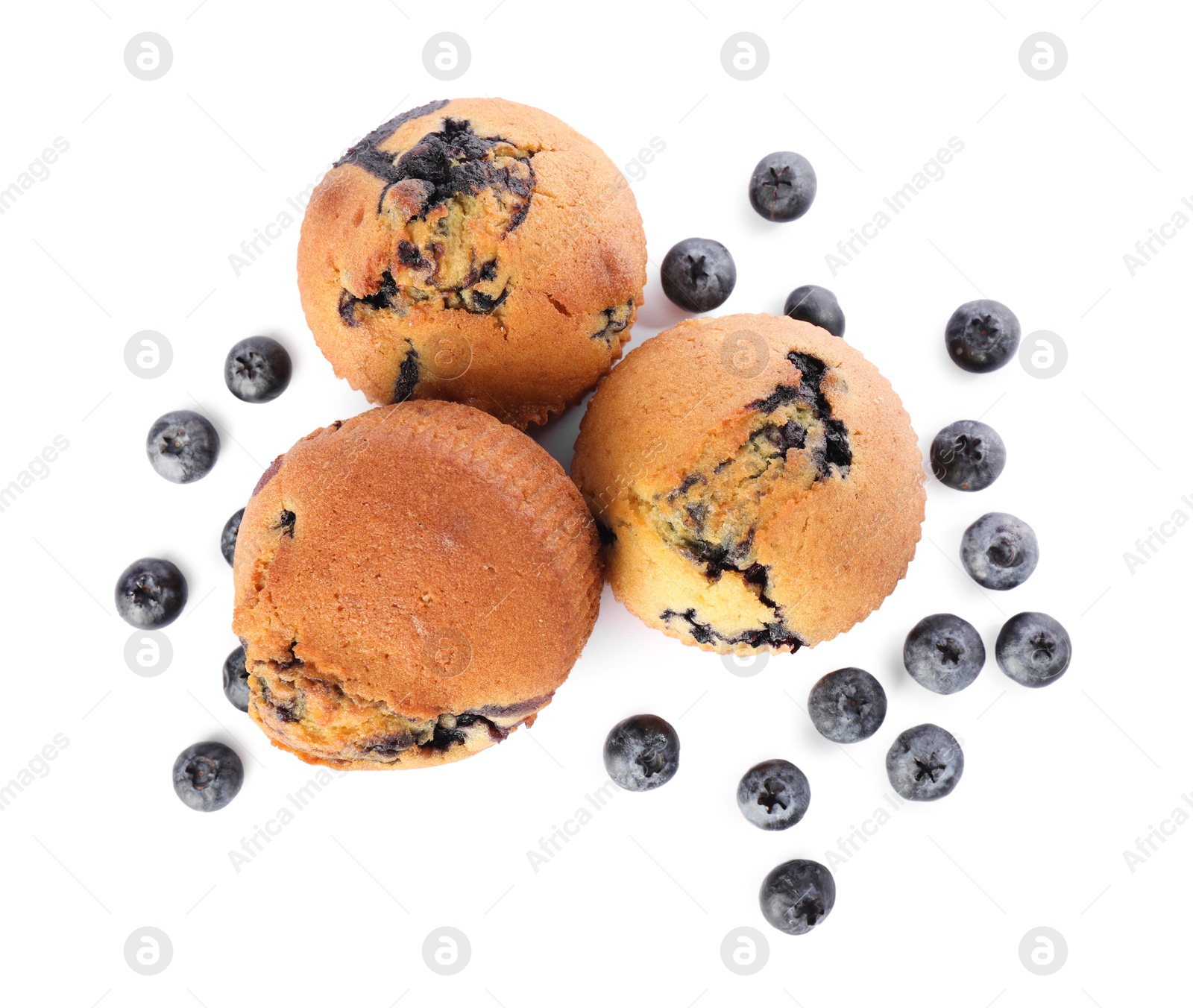 Photo of Delicious sweet muffins with blueberries isolated on white, top view