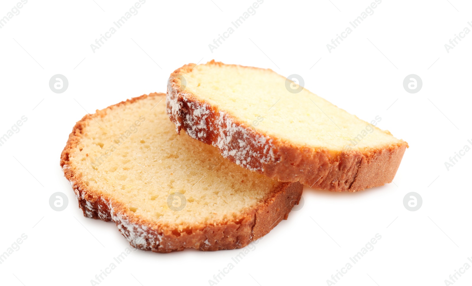 Photo of Slices of freshly baked sponge cake isolated on white