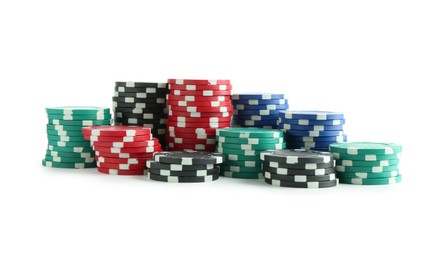 Photo of Poker game. Casino chips isolated on white