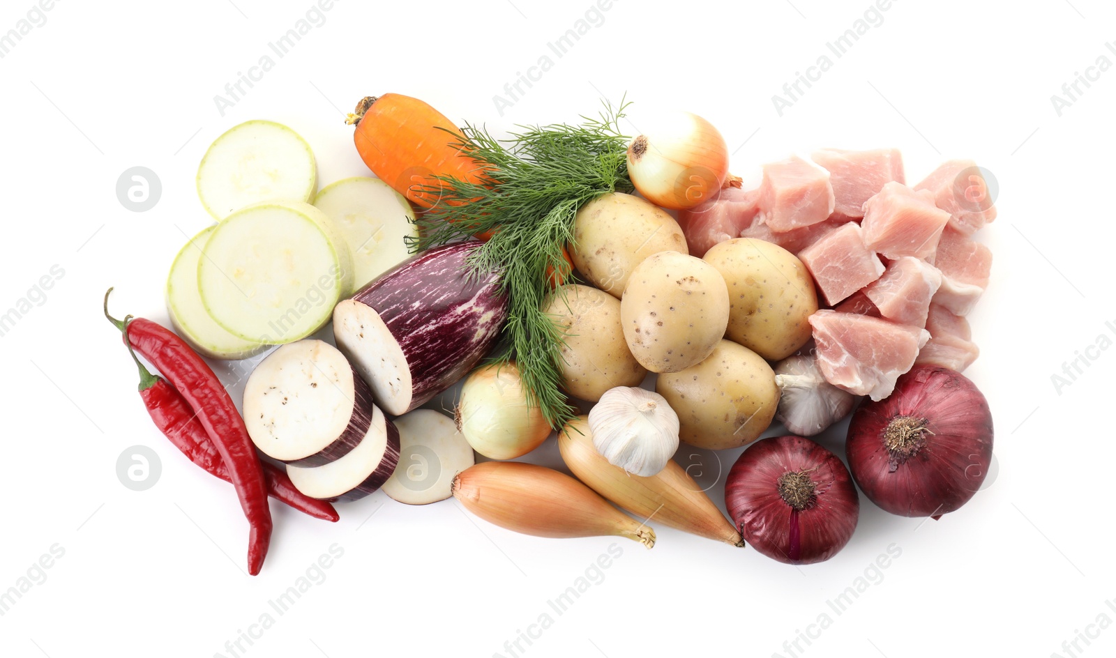 Photo of Uncooked ingredients for stew isolated on white, top view