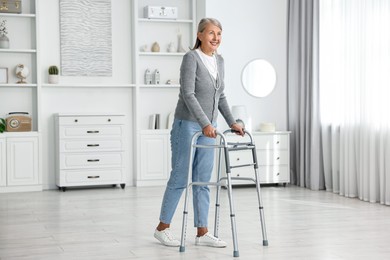 Senior woman with walking frame at home