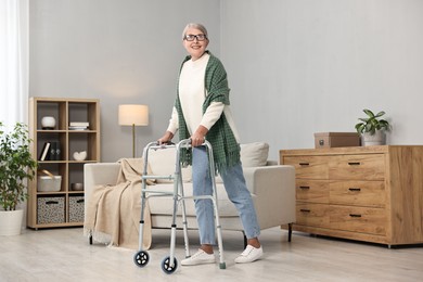 Senior woman with walking frame at home