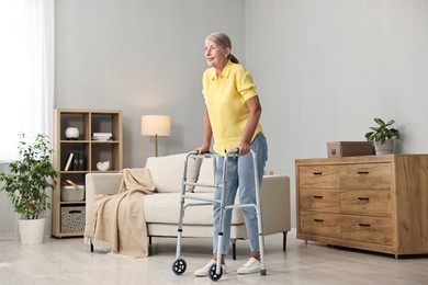 Senior woman with walking frame at home