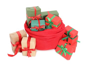 Photo of Santa Claus bag full of presents isolated on white