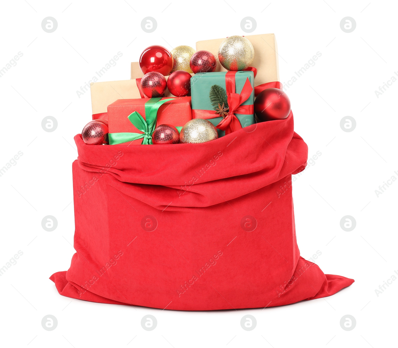 Photo of Santa Claus bag full of presents and decorative balls isolated on white