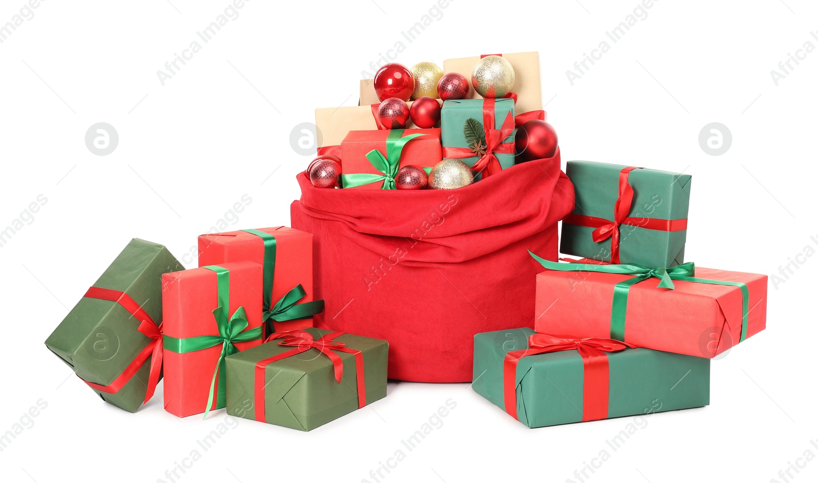 Photo of Santa Claus bag full of presents and decorative balls isolated on white