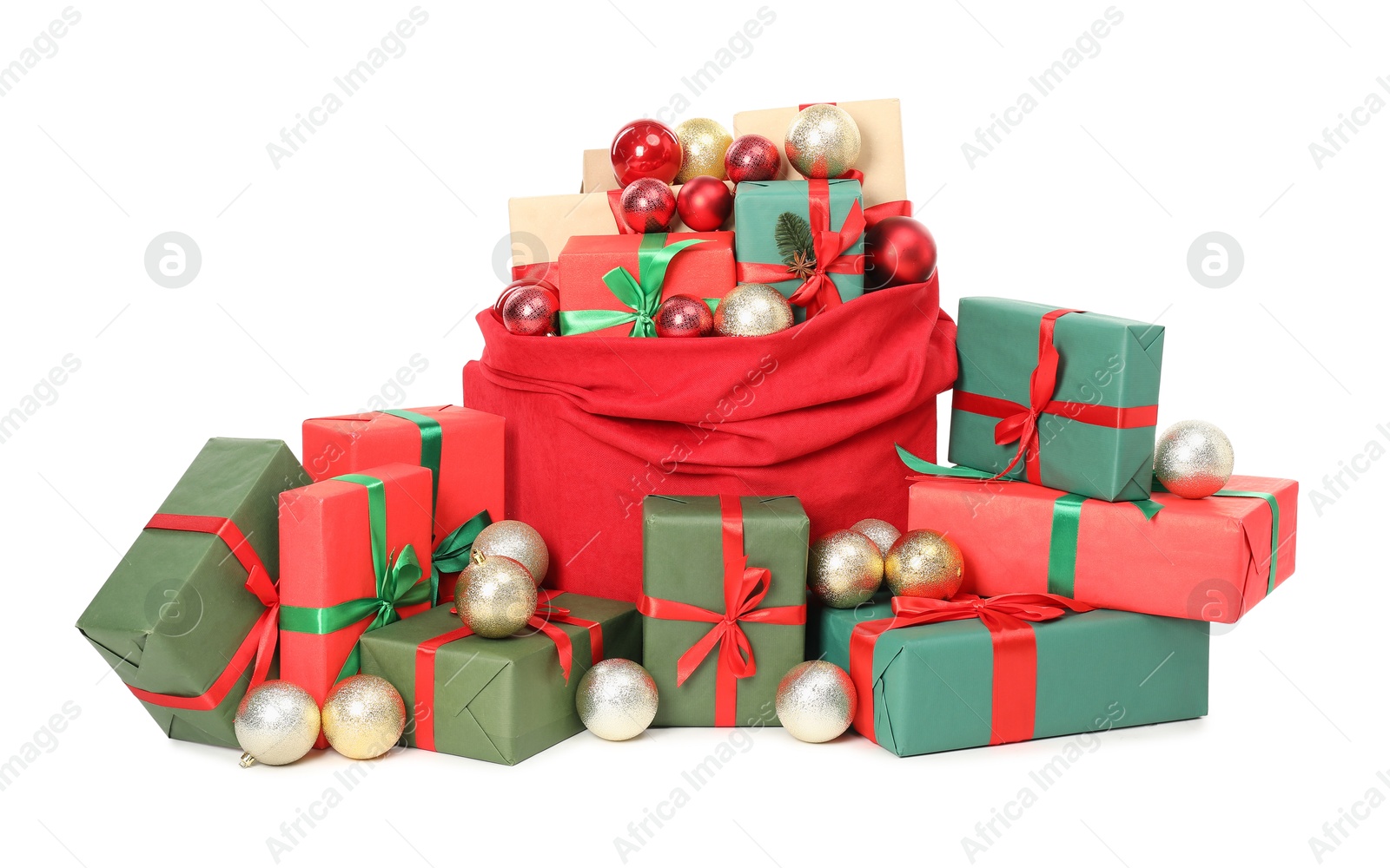 Photo of Santa Claus bag full of presents and decorative balls isolated on white