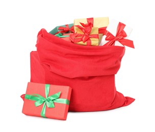 Photo of Santa Claus bag full of presents isolated on white