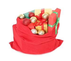 Photo of Santa Claus bag full of presents and decorative balls isolated on white