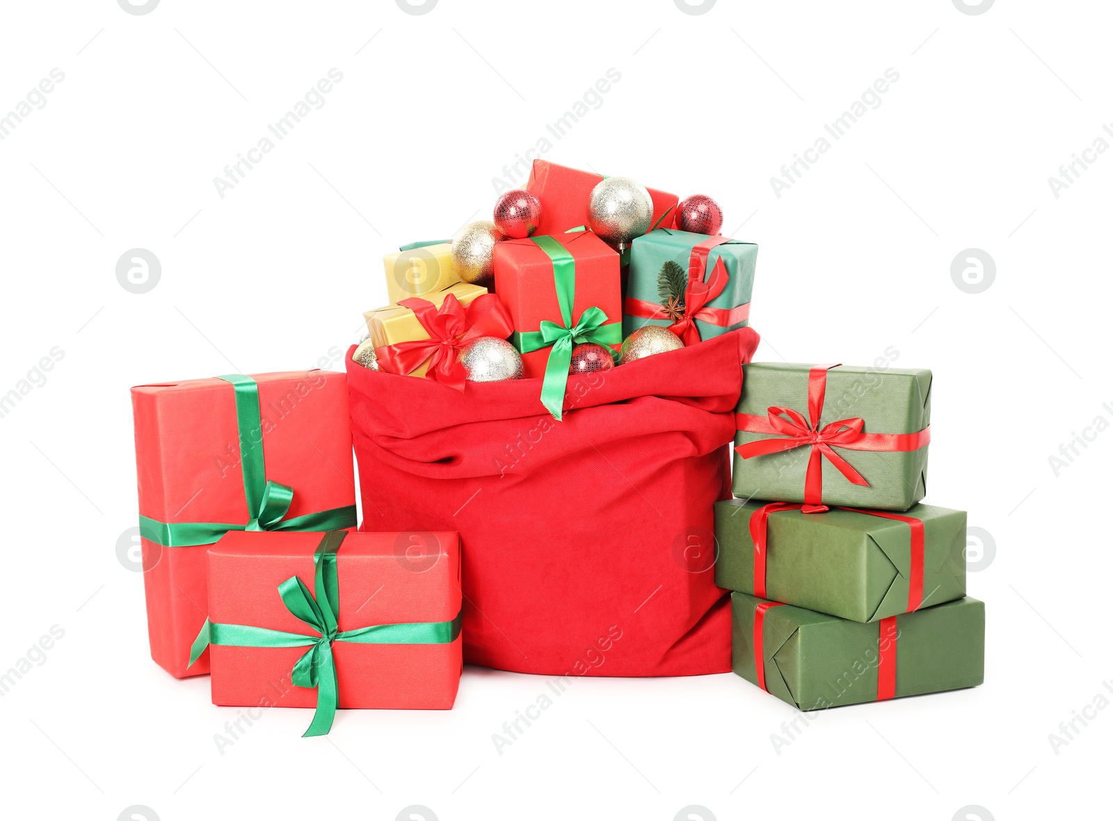 Photo of Santa Claus bag full of presents and decorative balls isolated on white