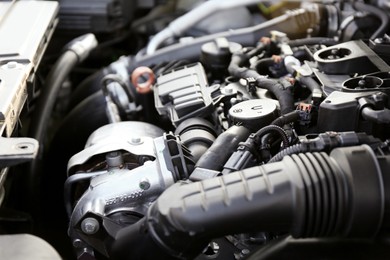 Photo of Closeup view of car engine in modern auto