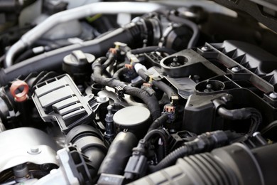 Photo of Closeup view of car engine in modern auto