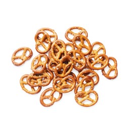 Photo of Many delicious pretzel crackers isolated on white, top view