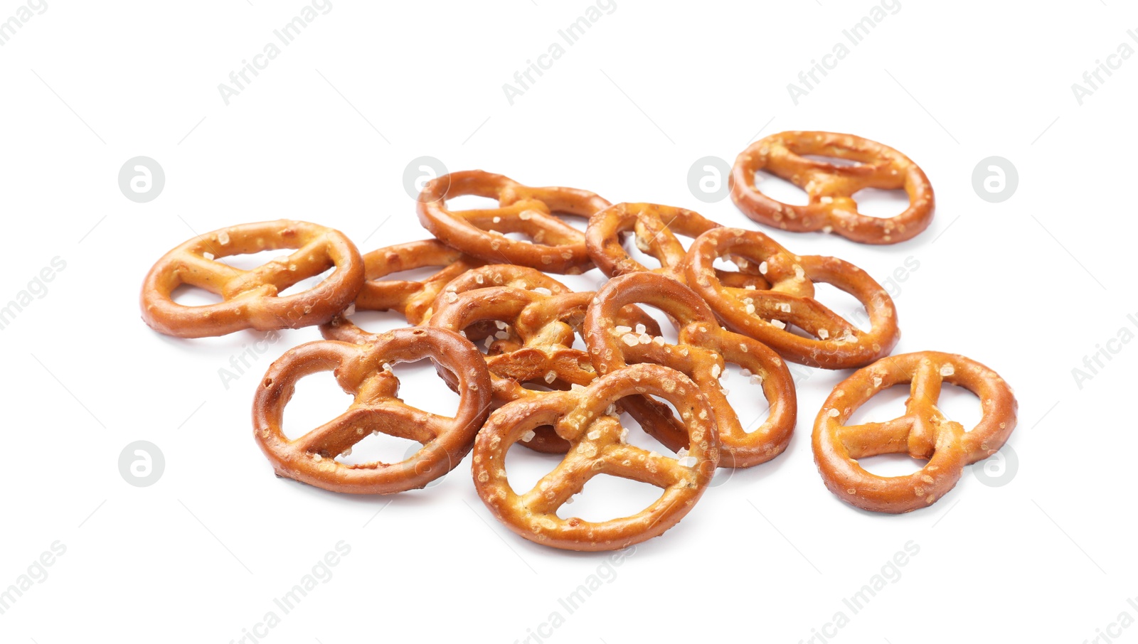 Photo of Many delicious pretzel crackers isolated on white