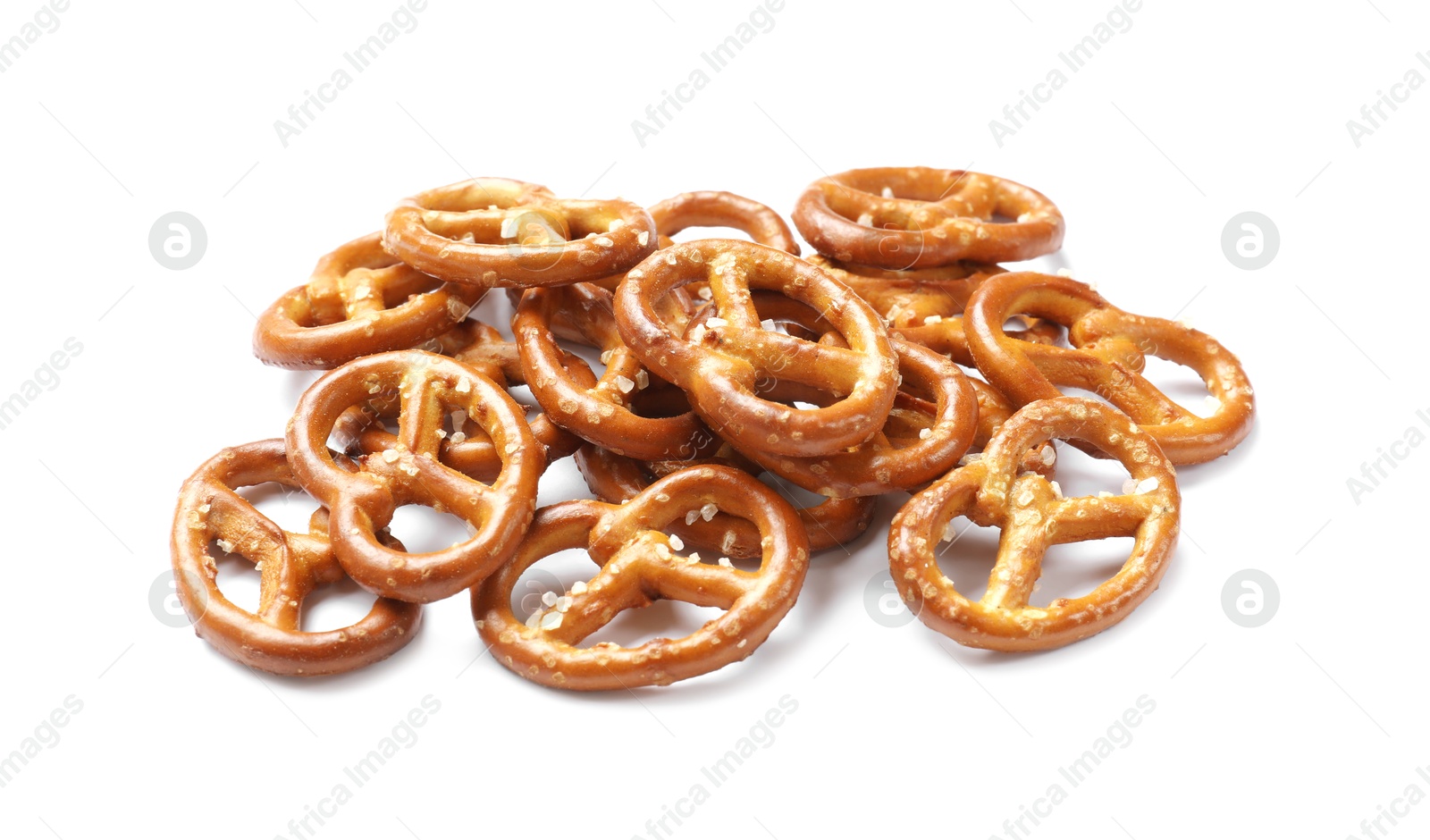 Photo of Many delicious pretzel crackers isolated on white