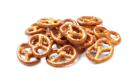 Photo of Many delicious pretzel crackers isolated on white