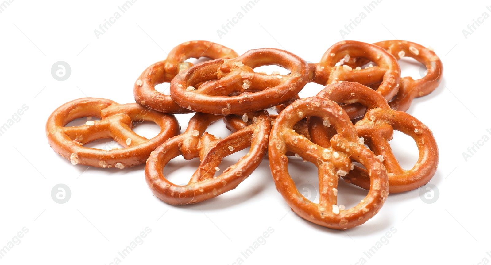 Photo of Many delicious pretzel crackers isolated on white