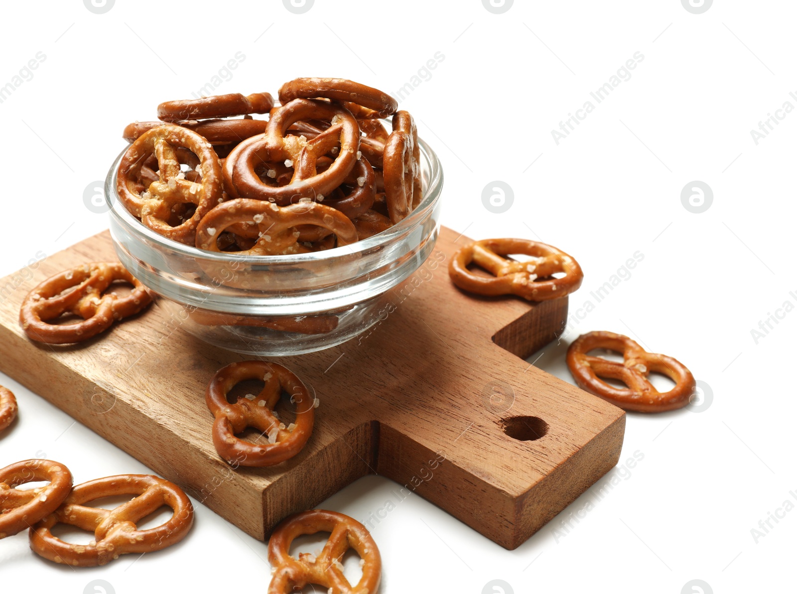 Photo of Delicious salty pretzel crackers on white table