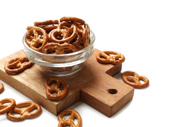 Photo of Delicious salty pretzel crackers on white table