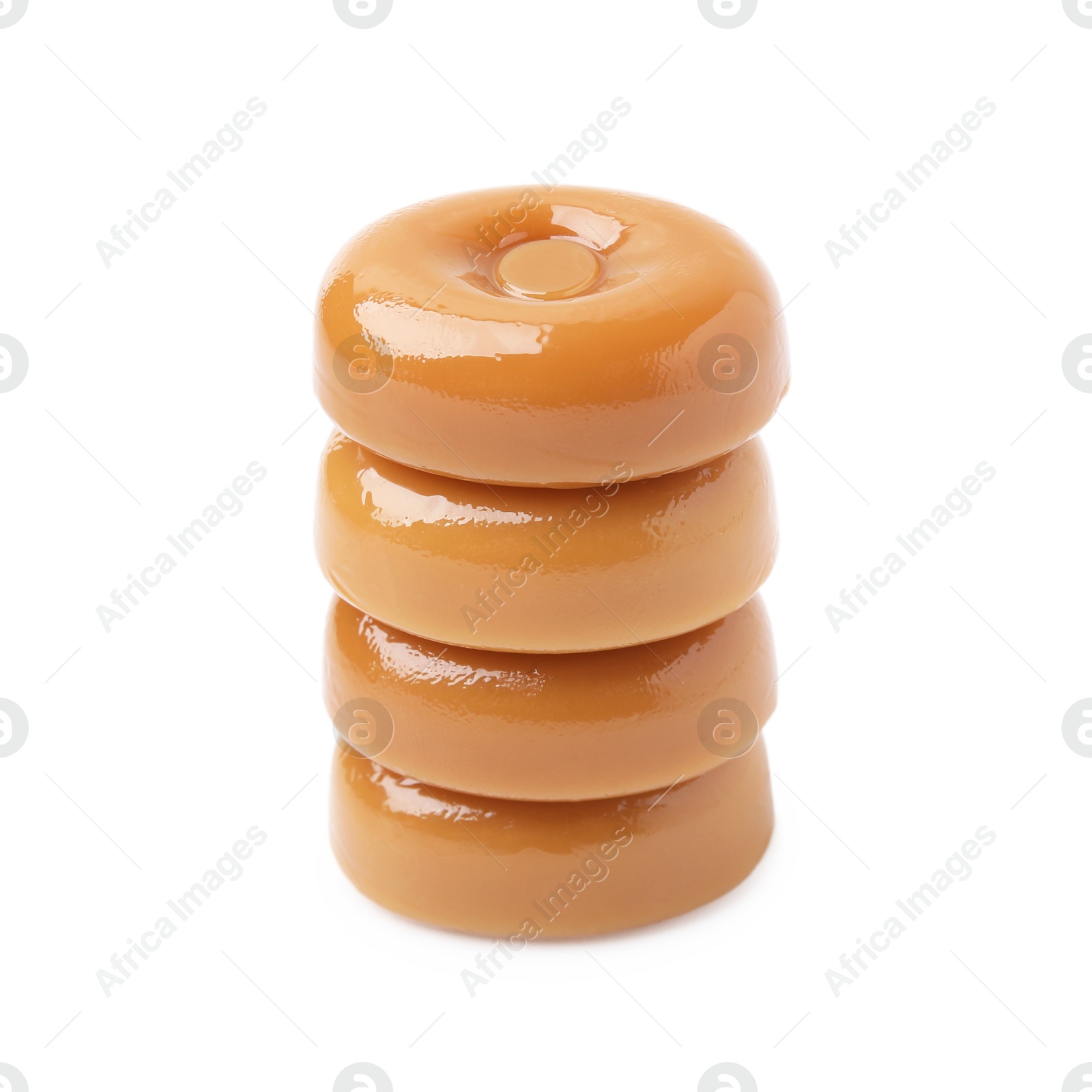 Photo of Stack of tasty hard toffee candies isolated on white