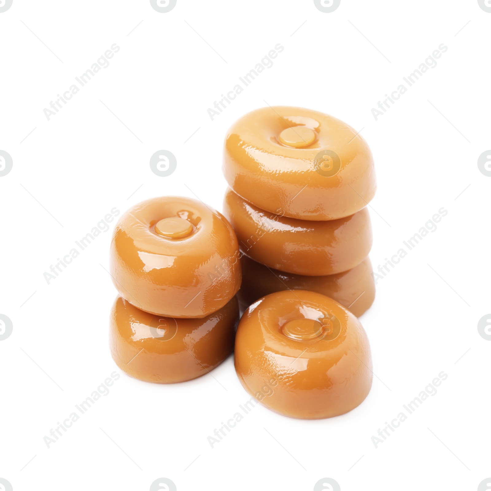 Photo of Tasty hard toffee candies isolated on white