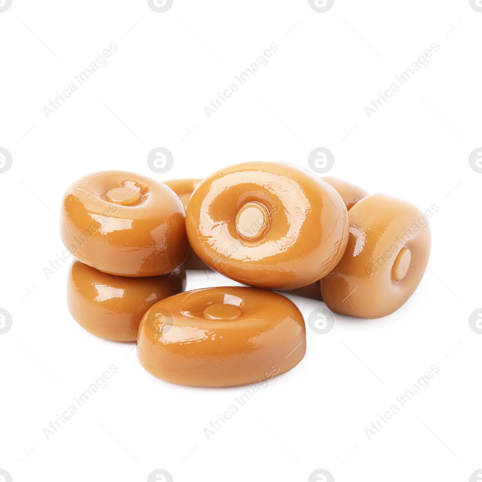 Photo of Tasty hard toffee candies isolated on white