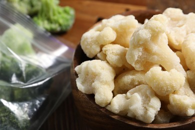 Photo of Frozen cauliflower in bowl on table, closeup